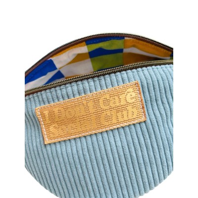 Sac banane en velours côtelé bleu ciel "I Don't Care Social Club"